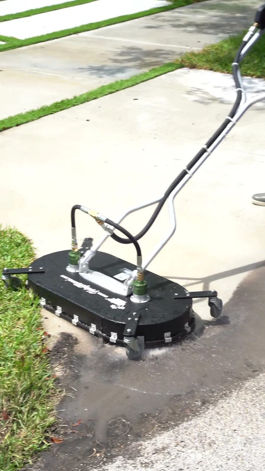 Driveway cleaned with a surface cleaner